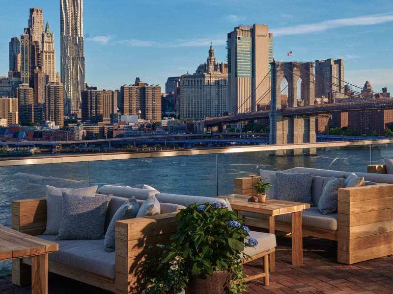 Harriet's Rooftop lounge seating with Brooklyn Bridge view